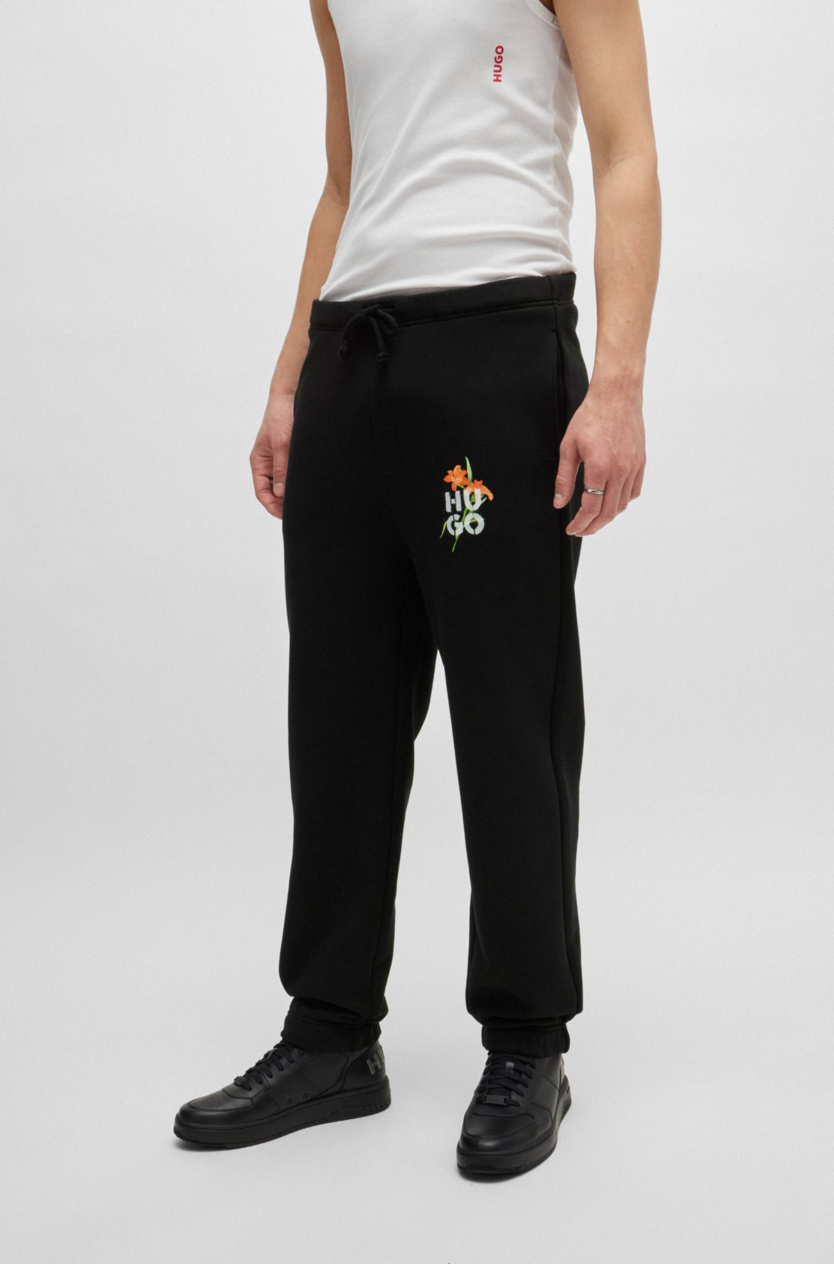 RELAXED-FIT TRACKSUIT BOTTOMS WITH FLORAL LOGO ARTWORK - 2