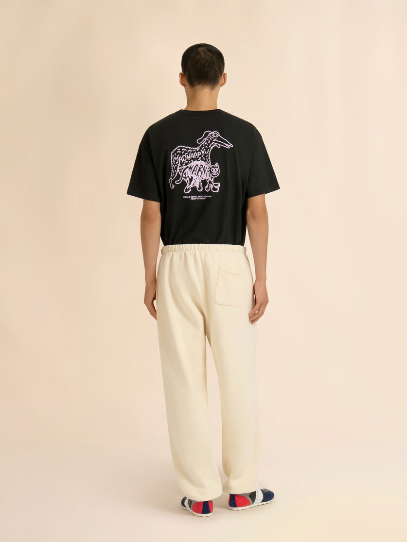MARNI + MADHAPPY CREAM COTTON SWEATPANTS WITH ARCH LOGO PRINT - 3