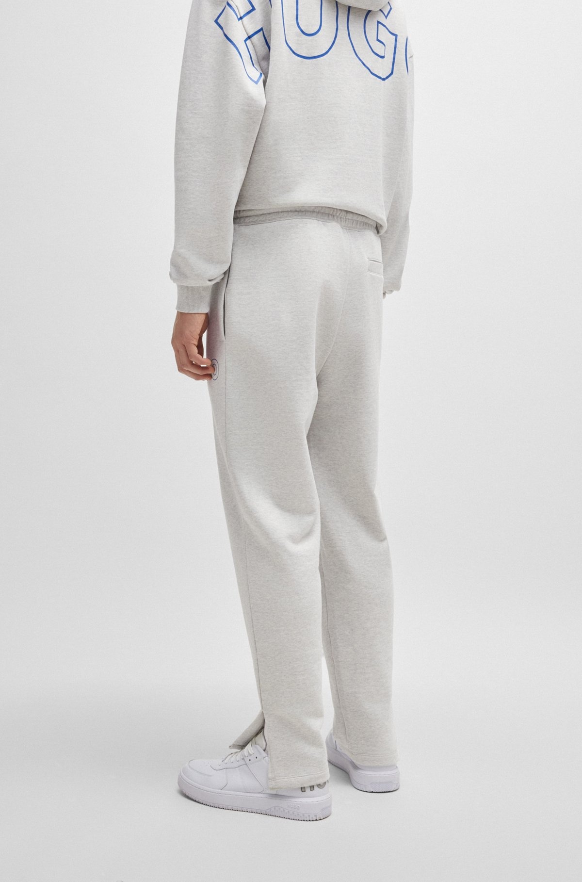 LOOSE-FIT COTTON-TERRY TRACKSUIT BOTTOMS WITH OUTLINE LOGO - 5