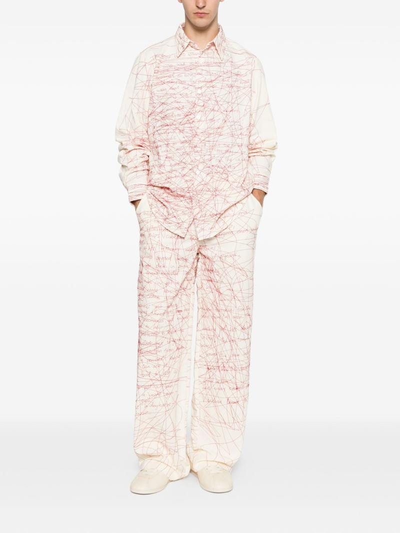 KidSuper scribbled printed trousers outlook