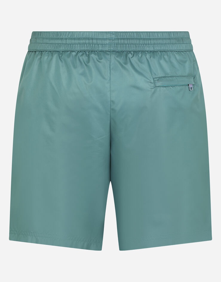 Mid-length swim trunks with heraldic patch - 1