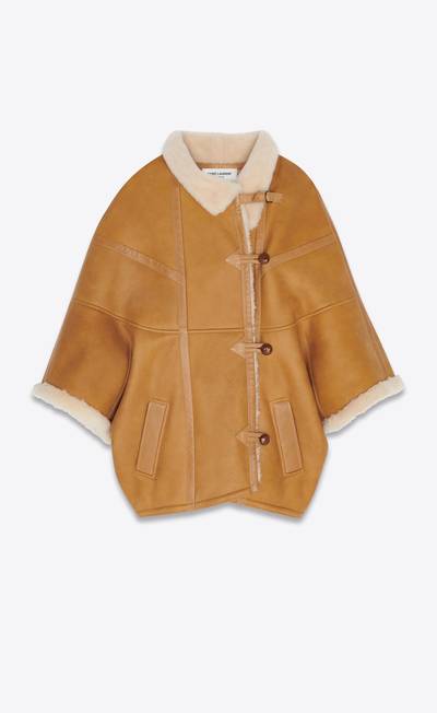 SAINT LAURENT cape in shearling outlook