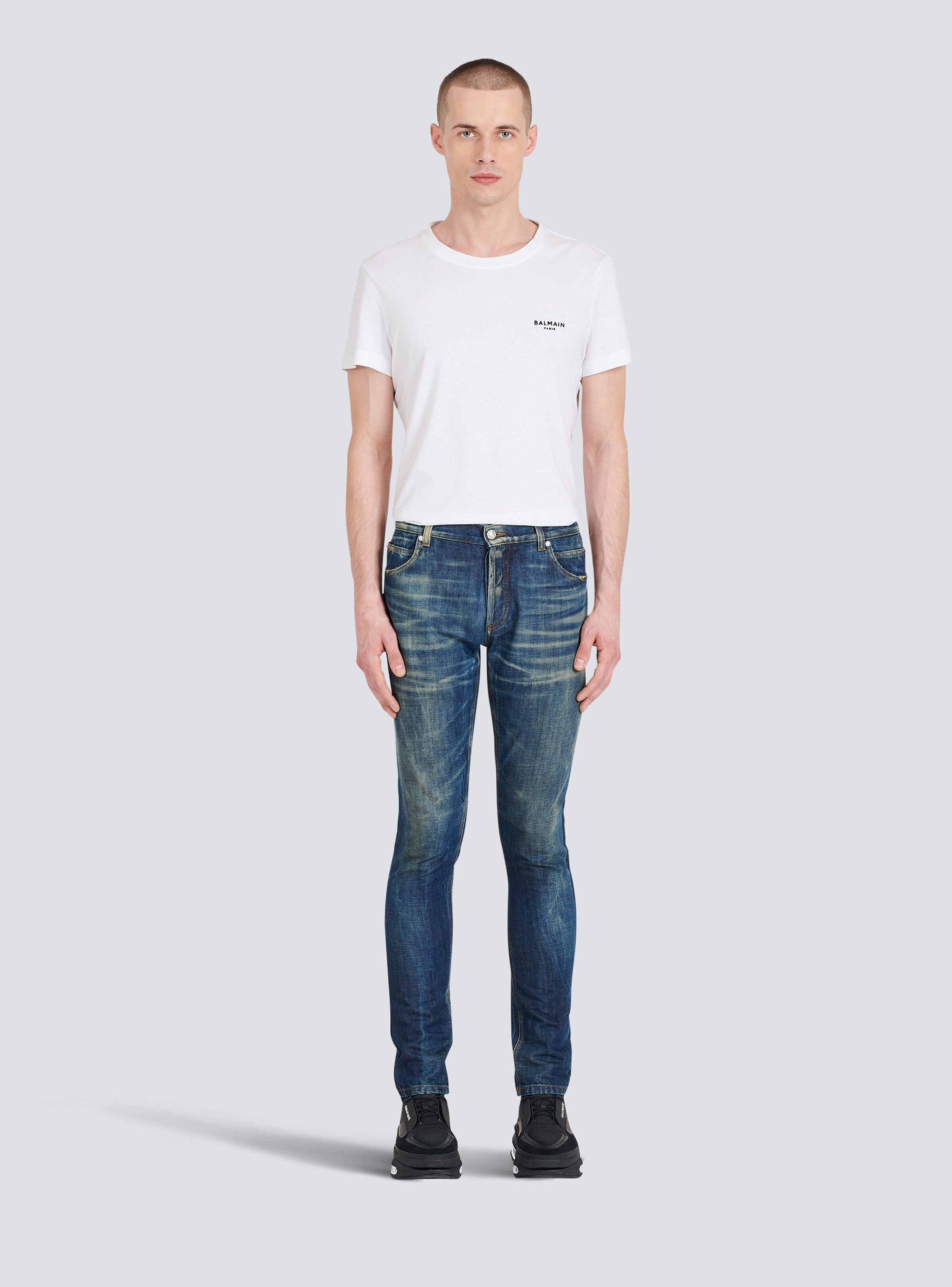 Slim cut faded cotton jeans - 3