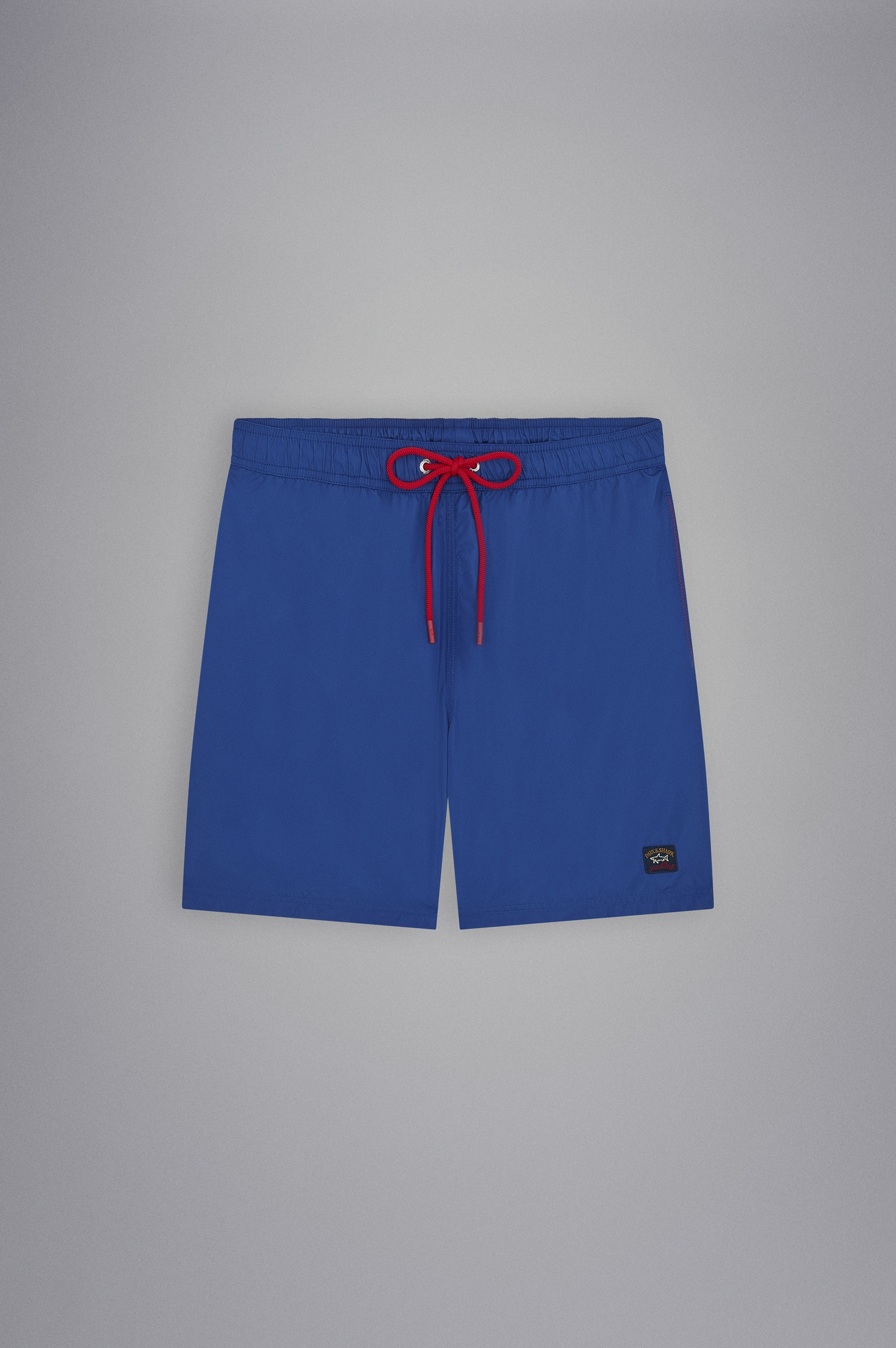 SWIM SHORTS WITH ICONIC BADGE - 1