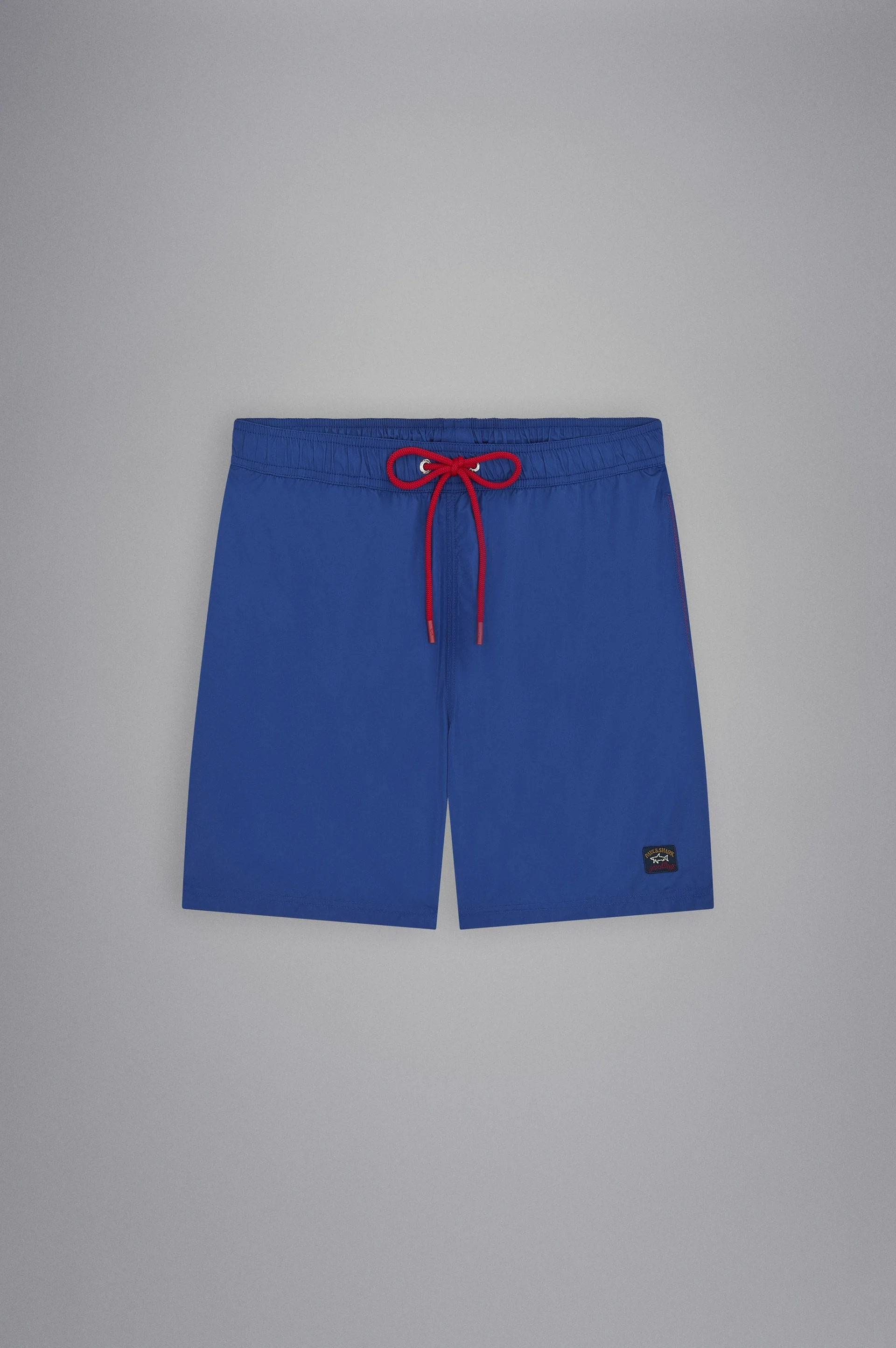 SWIM SHORTS WITH ICONIC BADGE - 1
