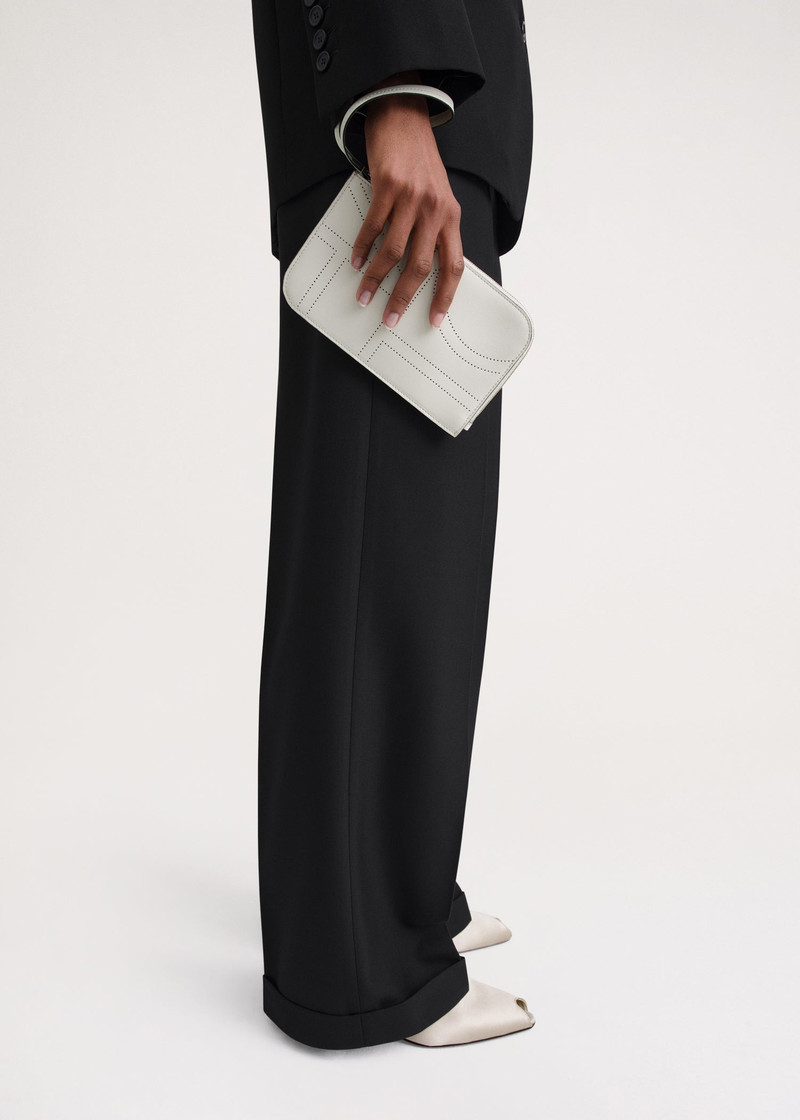 Totême Monogram leather wristlet pouch milk outlook