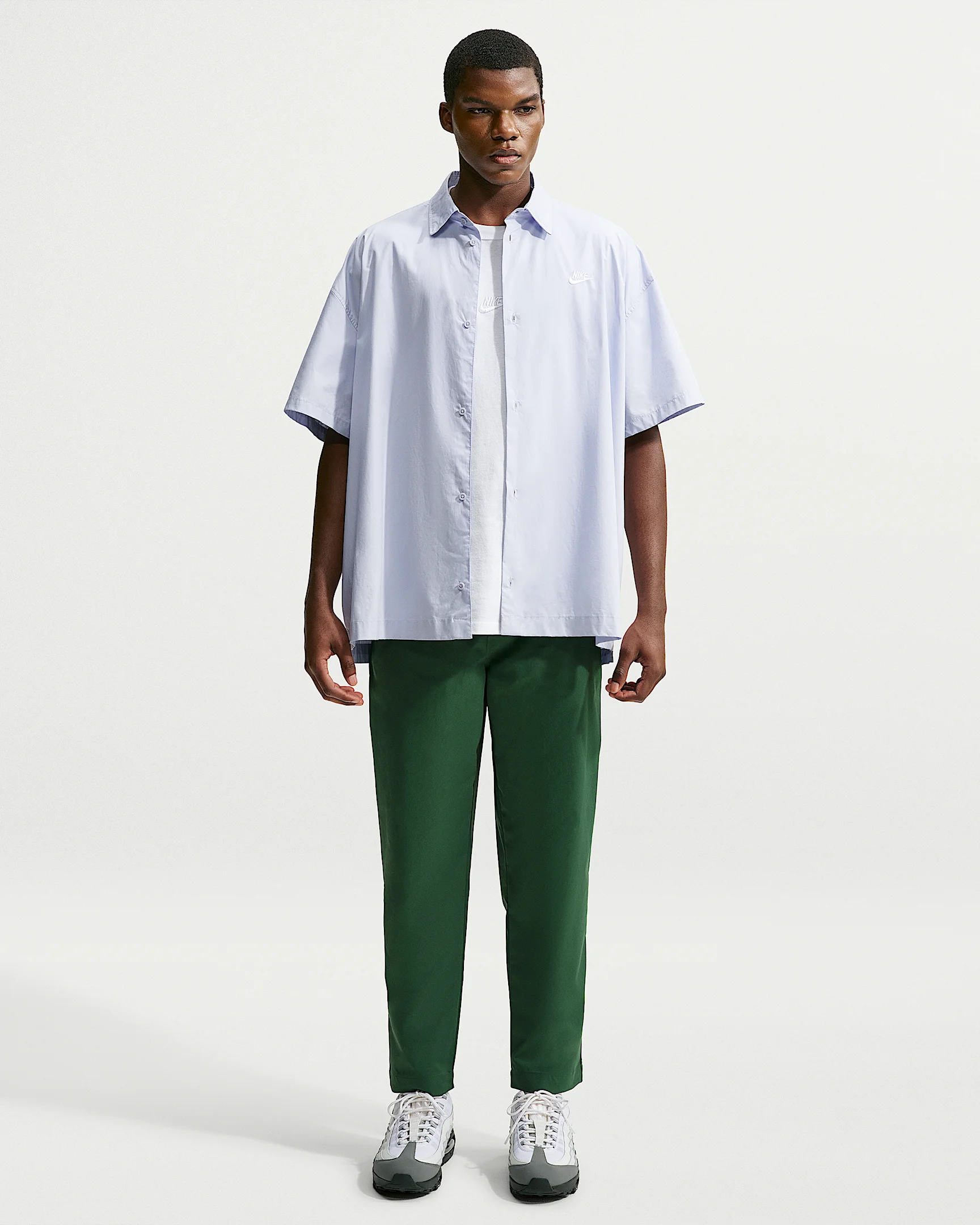 Nike Club Men's Woven Tapered Pants - 1