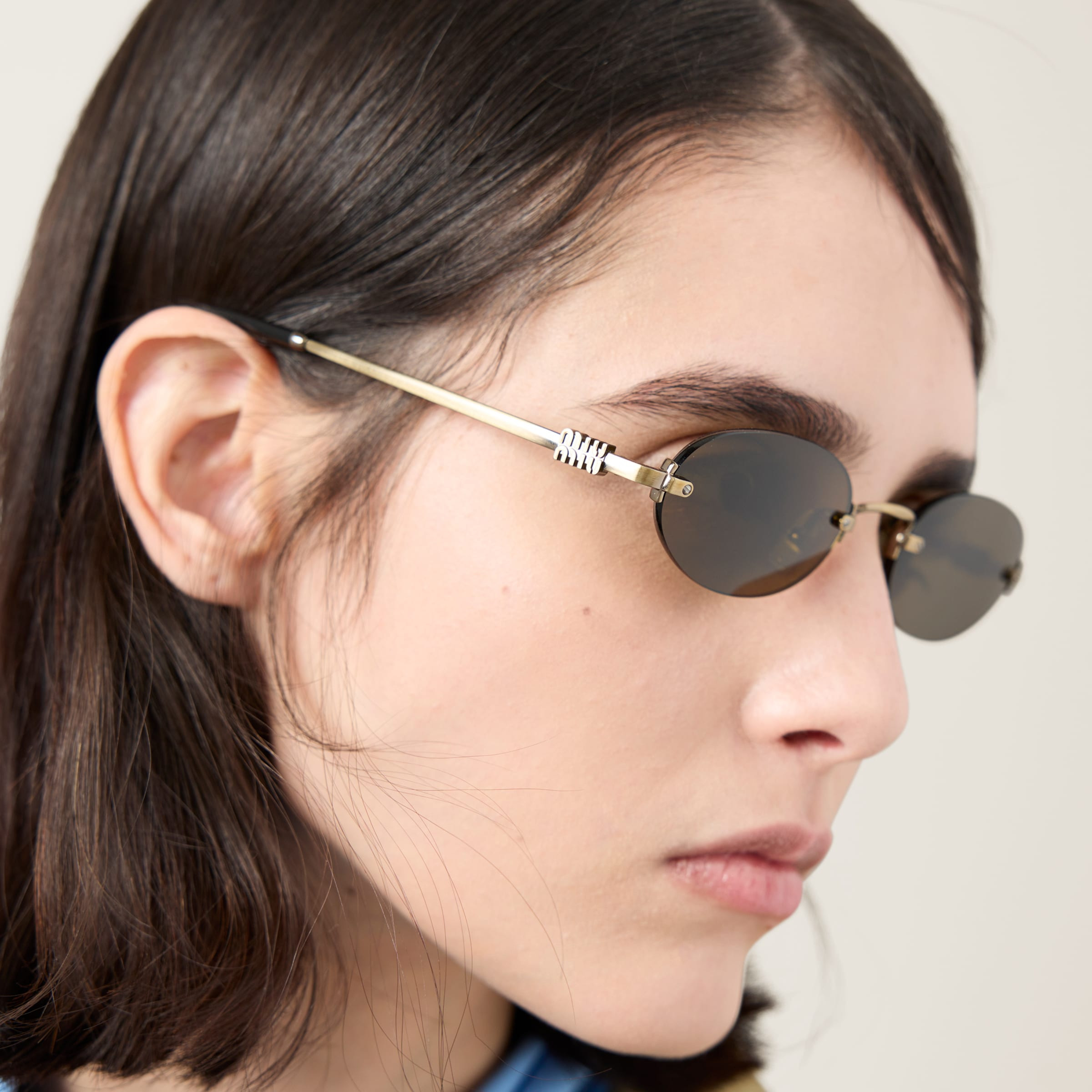 MIU MIU ミュウミュウ　M Logo Sunglasses Miu Miu Miu Miu Logo sunglasses | REVERSIBLE