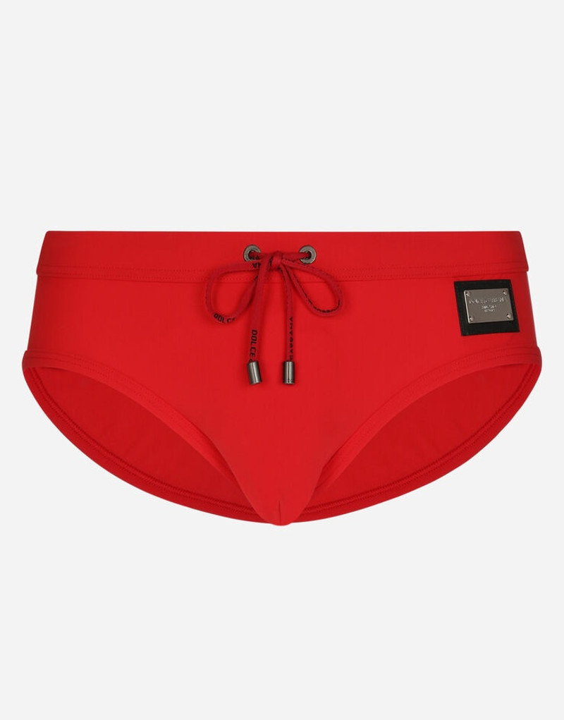 Swim briefs with high-cut leg and branded tag 1