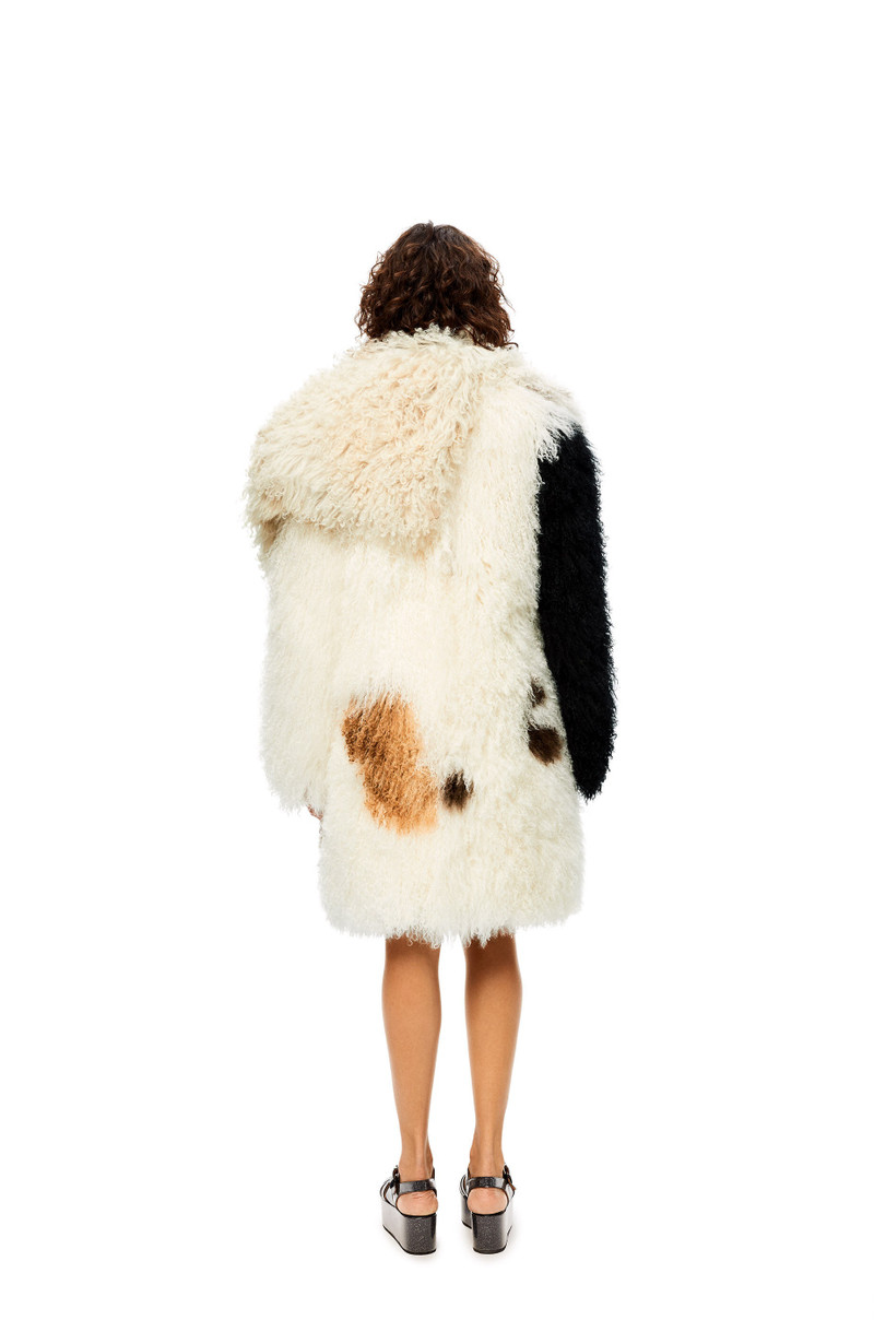Coat in shearling 4