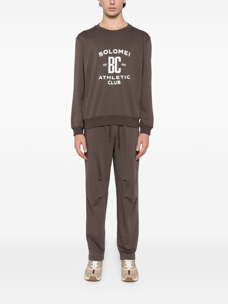 Brunello Cucinelli pleated track pants outlook