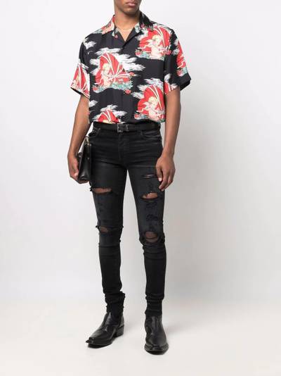 AMIRI distressed skinny jeans outlook