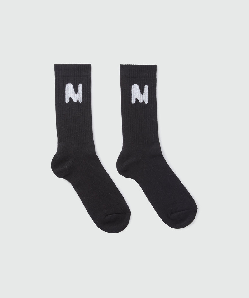 Black socks with "TheMwave" jacquard graphic 1