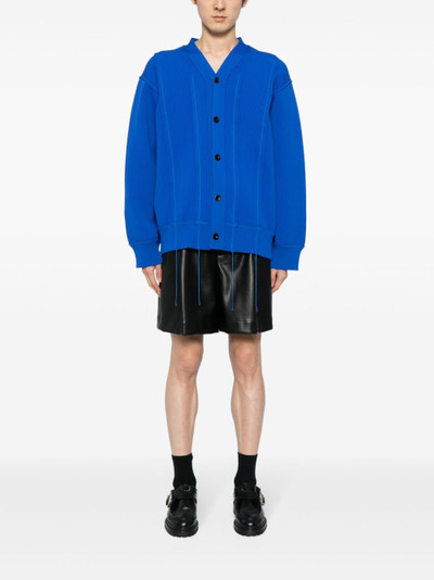 sacai belted pleated shorts outlook
