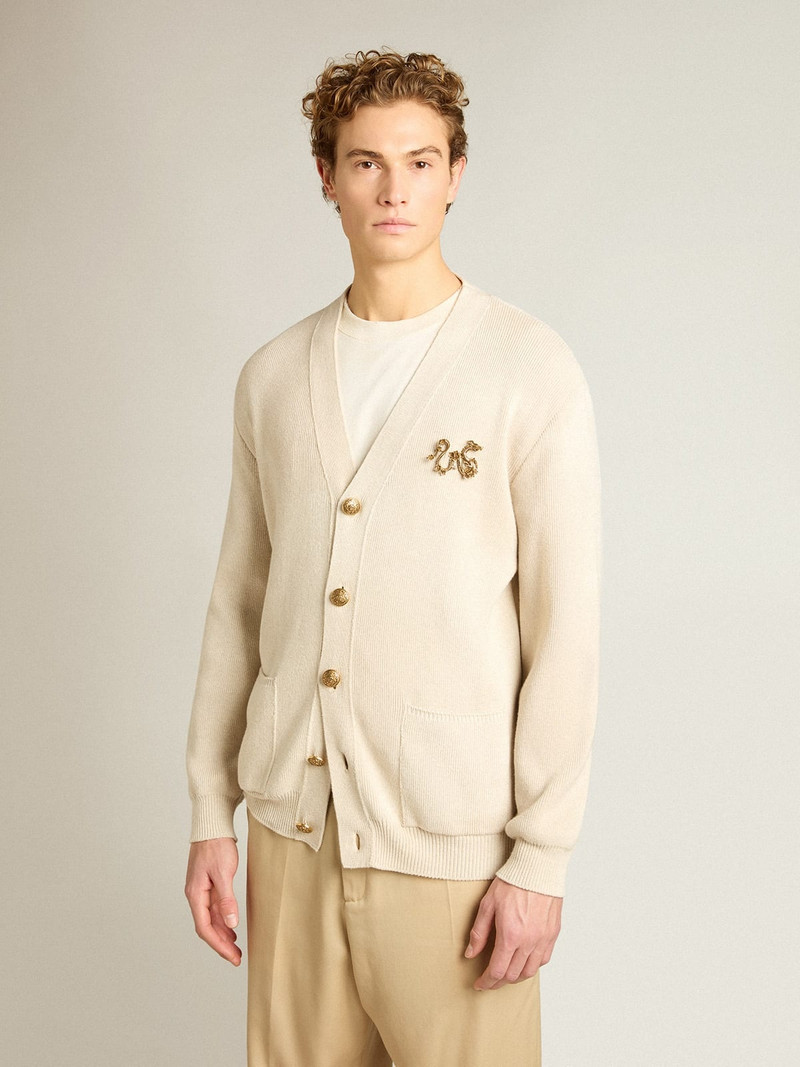 Cardigan in aged white cotton with gold button fastening 2
