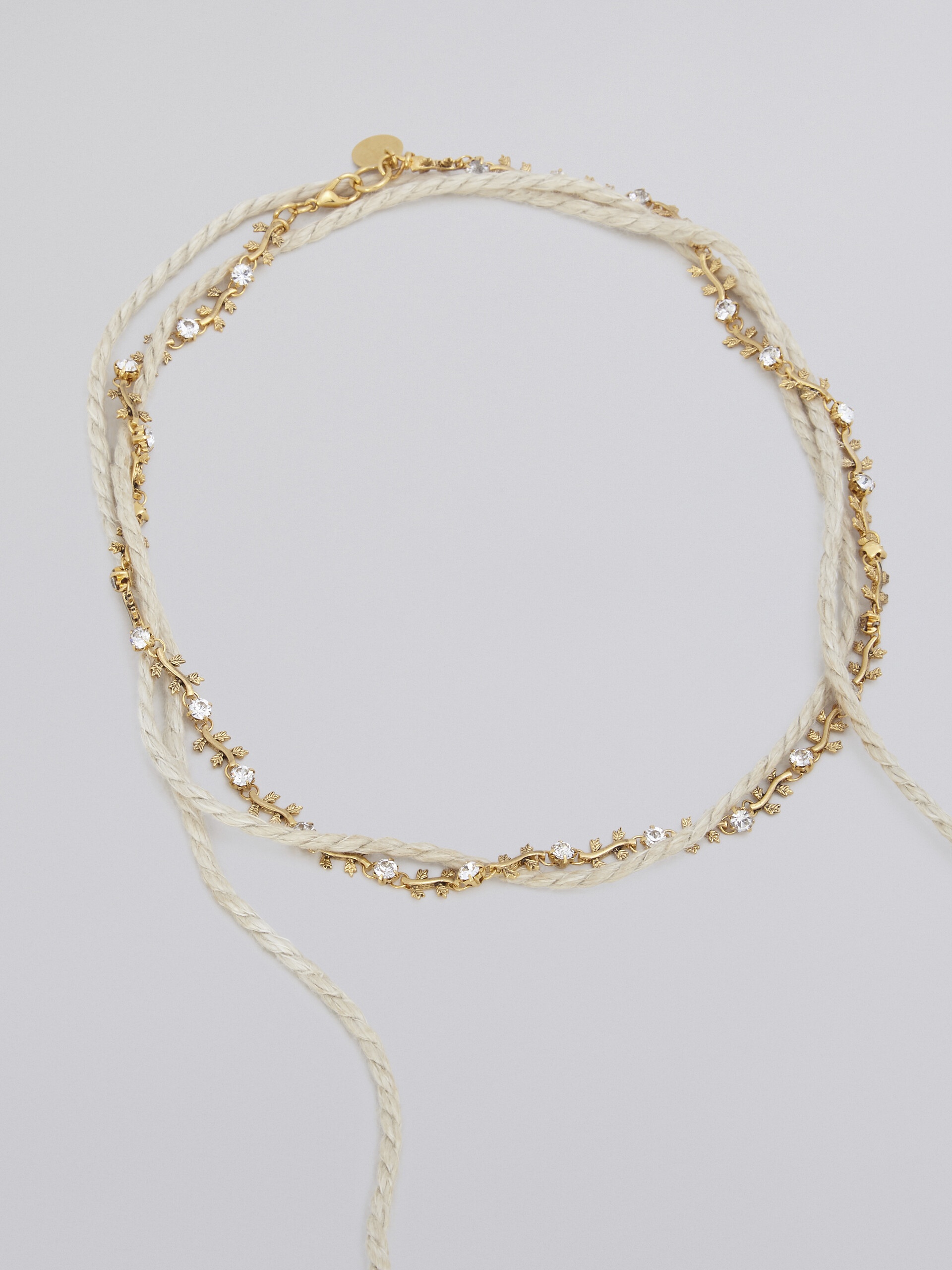 SET OF TWO FOUND BRASS NECKLACES - 2
