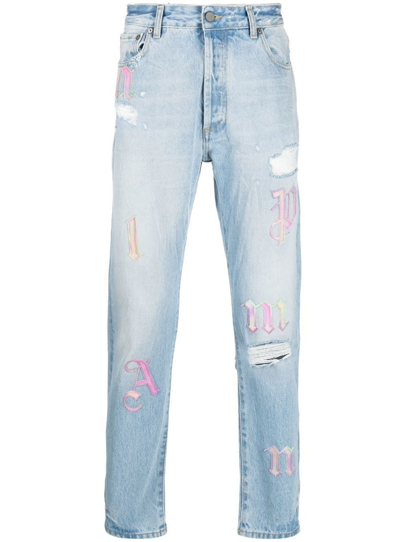 ripped embroidered tapered jeans 1