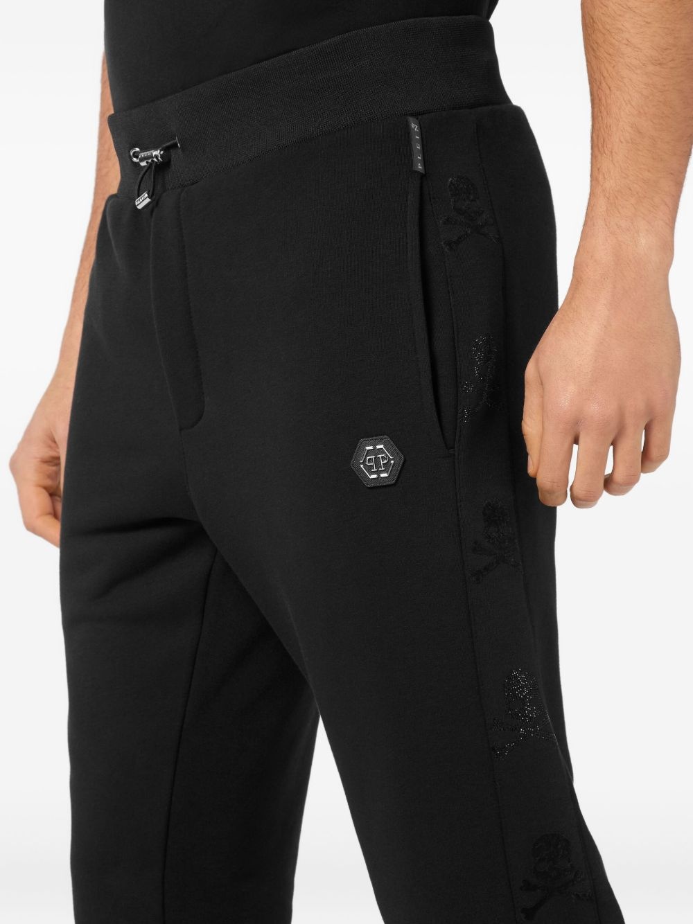 skull-studded track pants - 5