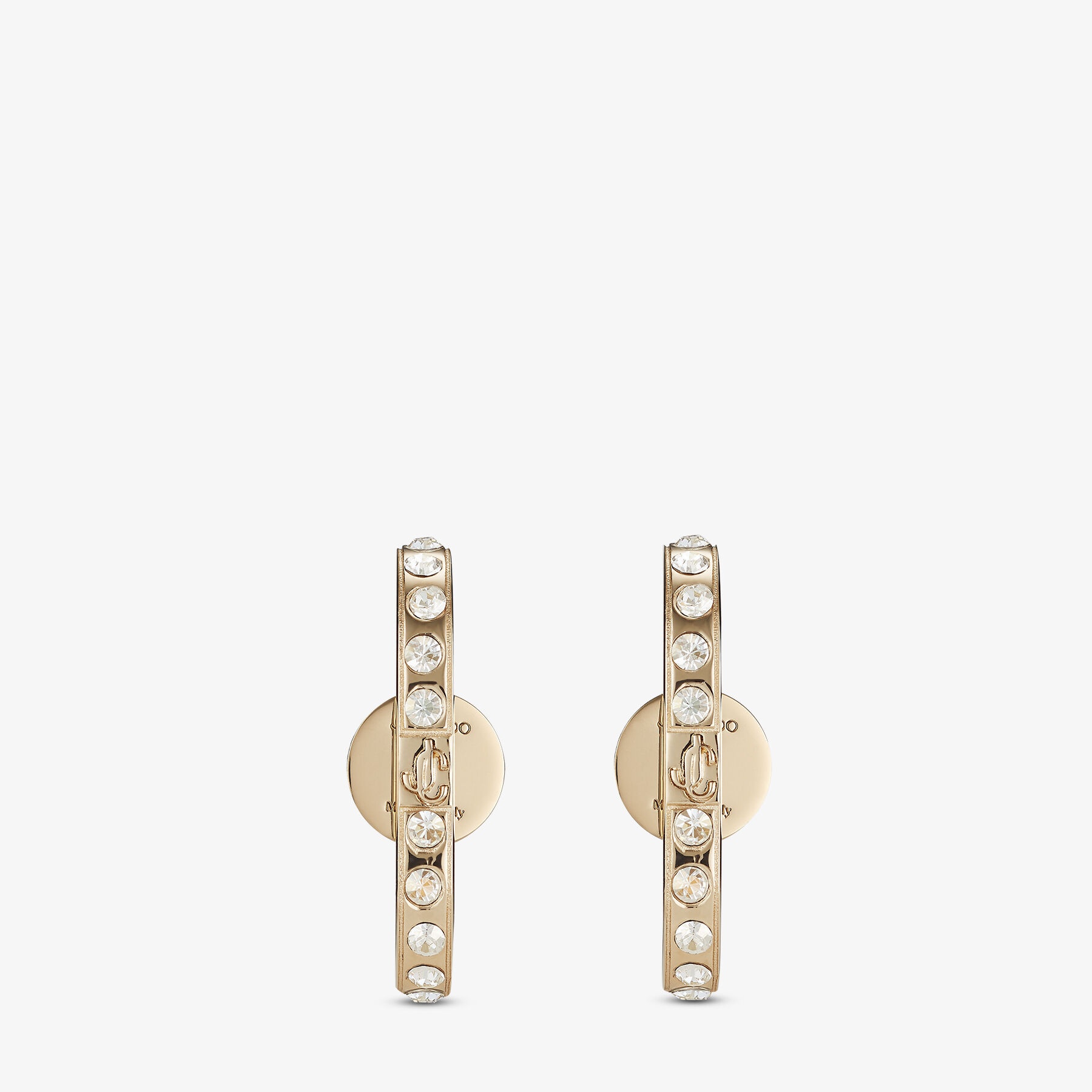 JC Cuff Earring
Gold-finish Metal and Crystal Cuff Earrings with JC Monogram - 1