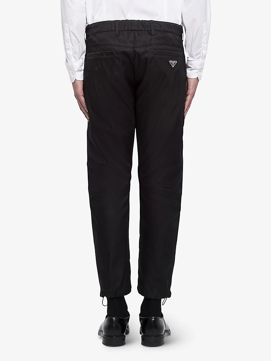 Brand-plaque drawstring-hem skinny-fit slim-leg Re-Nylon trousers - 4