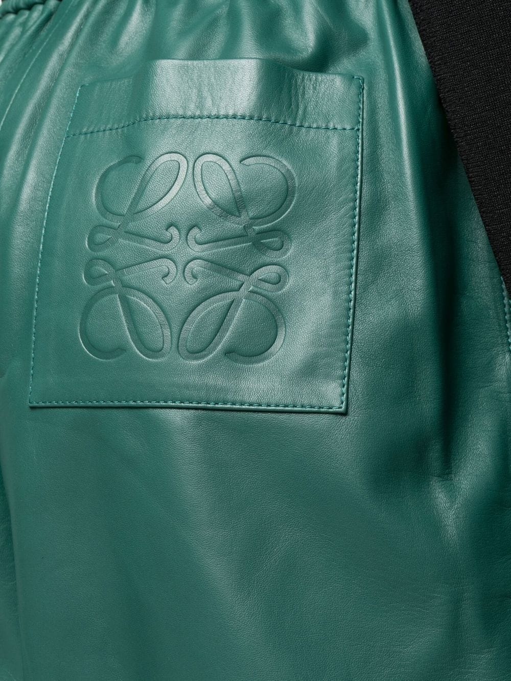 embossed-logo leather shorts - 5