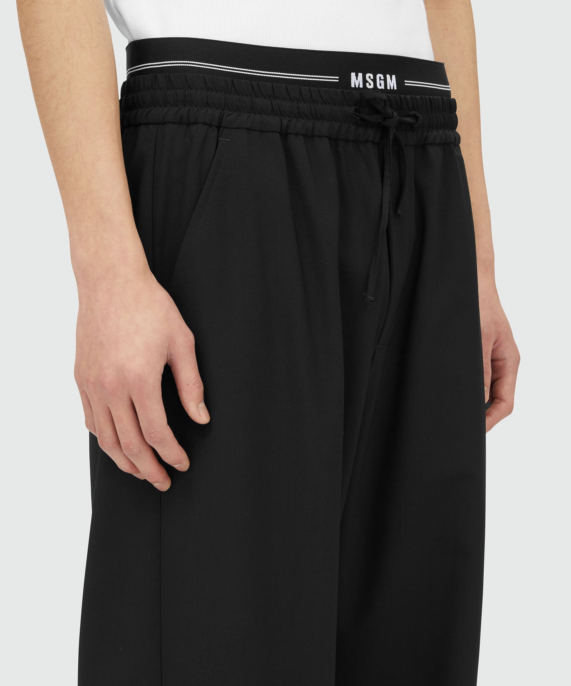 Black virgin wool pants with elastic logo - 5