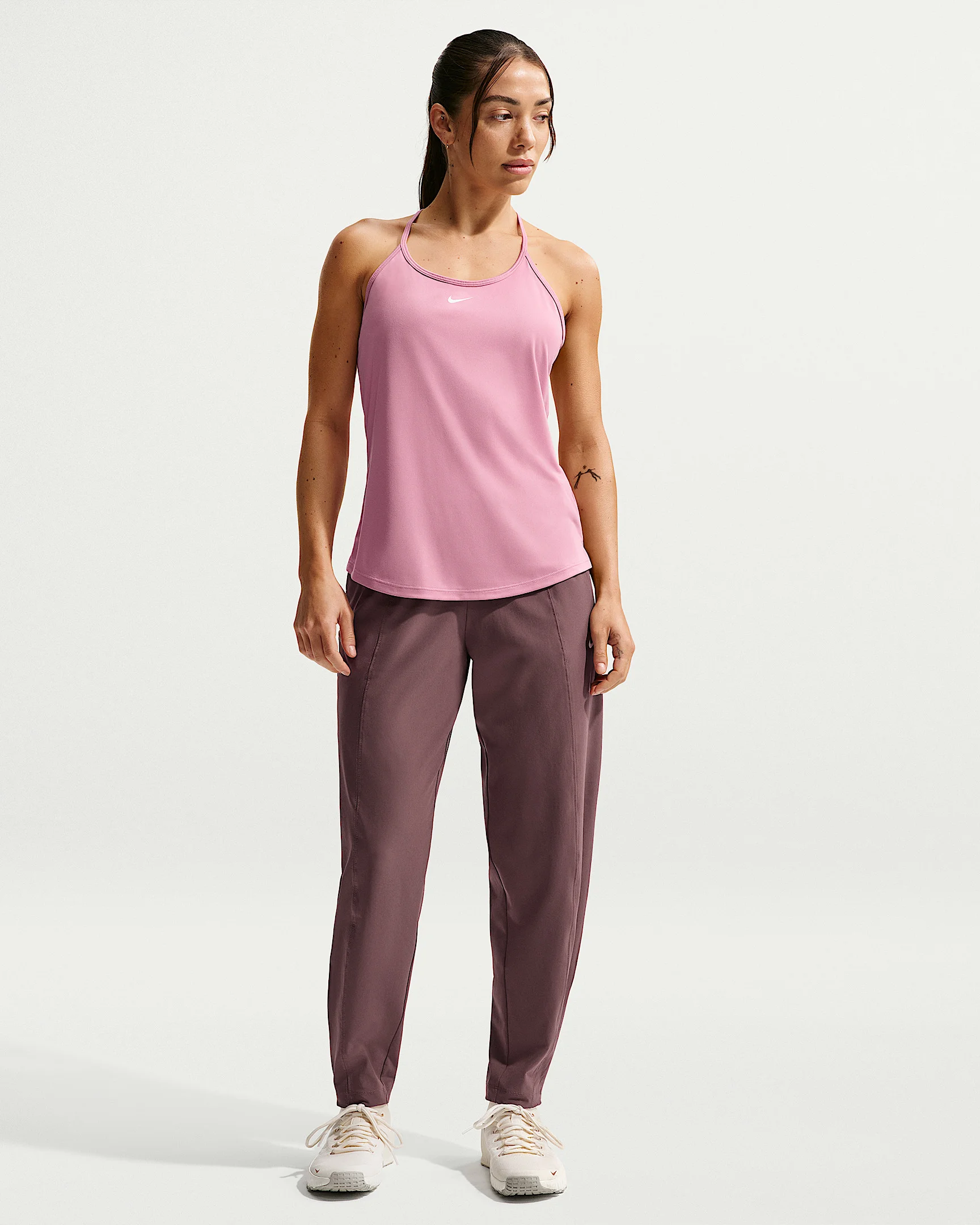 Nike One Women's Dri-FIT Mid-Rise Woven Pants - 1