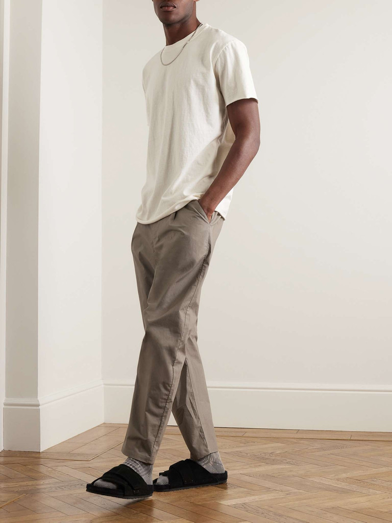 John Elliott Studio Tapered Pleated Cotton Drawstring Trousers outlook