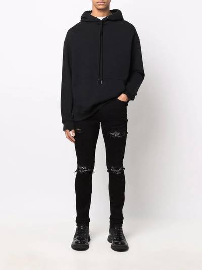 AMIRI ripped-detailing skinny jeans outlook