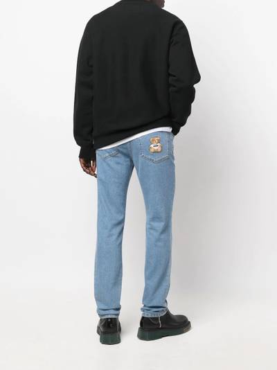 Moschino logo slim-fit jeans outlook