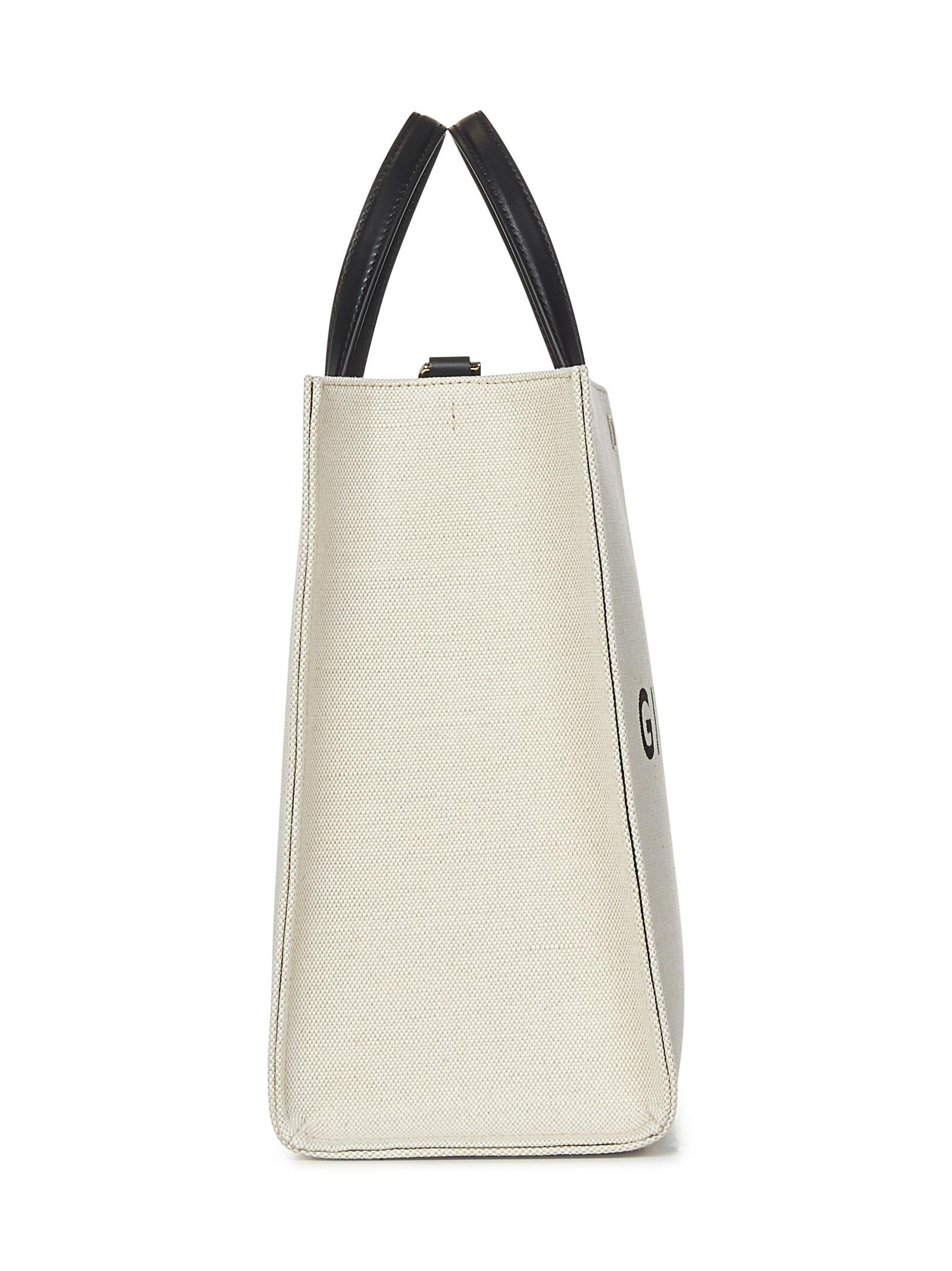 Beige cotton and linen canvas tote bag with signature at front and removable shoulder strap. - 3