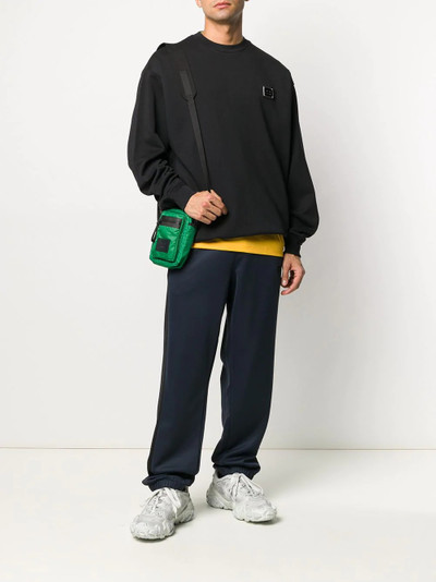 Acne Studios side stripe loose-fit track pants outlook