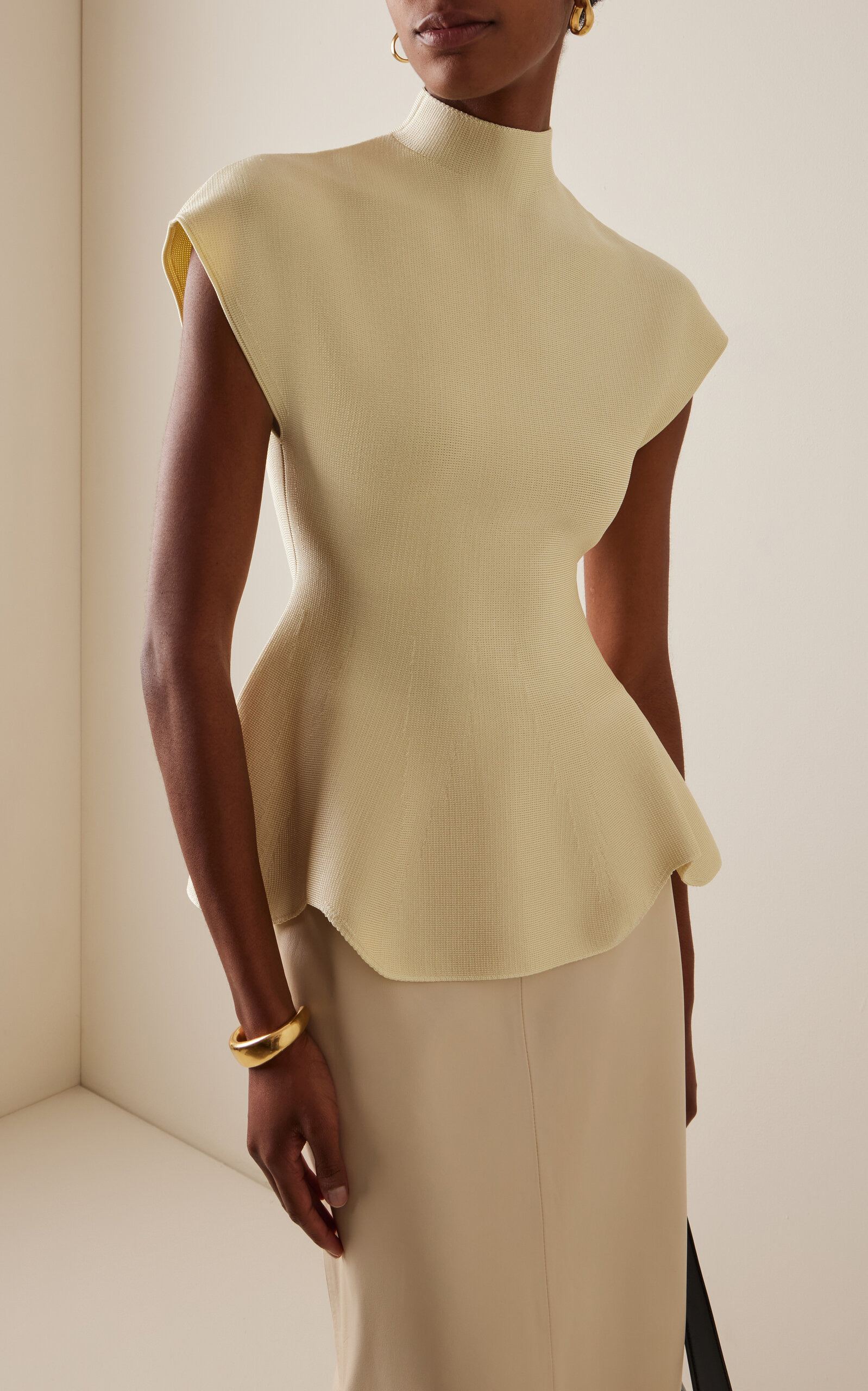 KHAITE Andra Knit Peplum Top yellow | REVERSIBLE