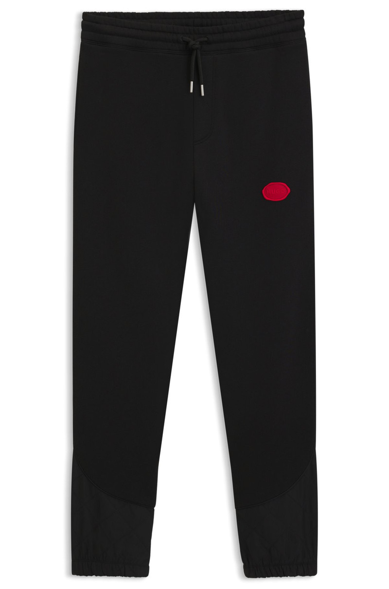 COTTON-BLEND TRACKSUIT BOTTOMS WITH WAXED-STAMP LOGO 1