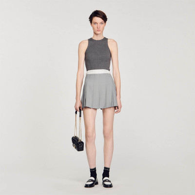 Sandro Short pleated skirt with satin finish outlook