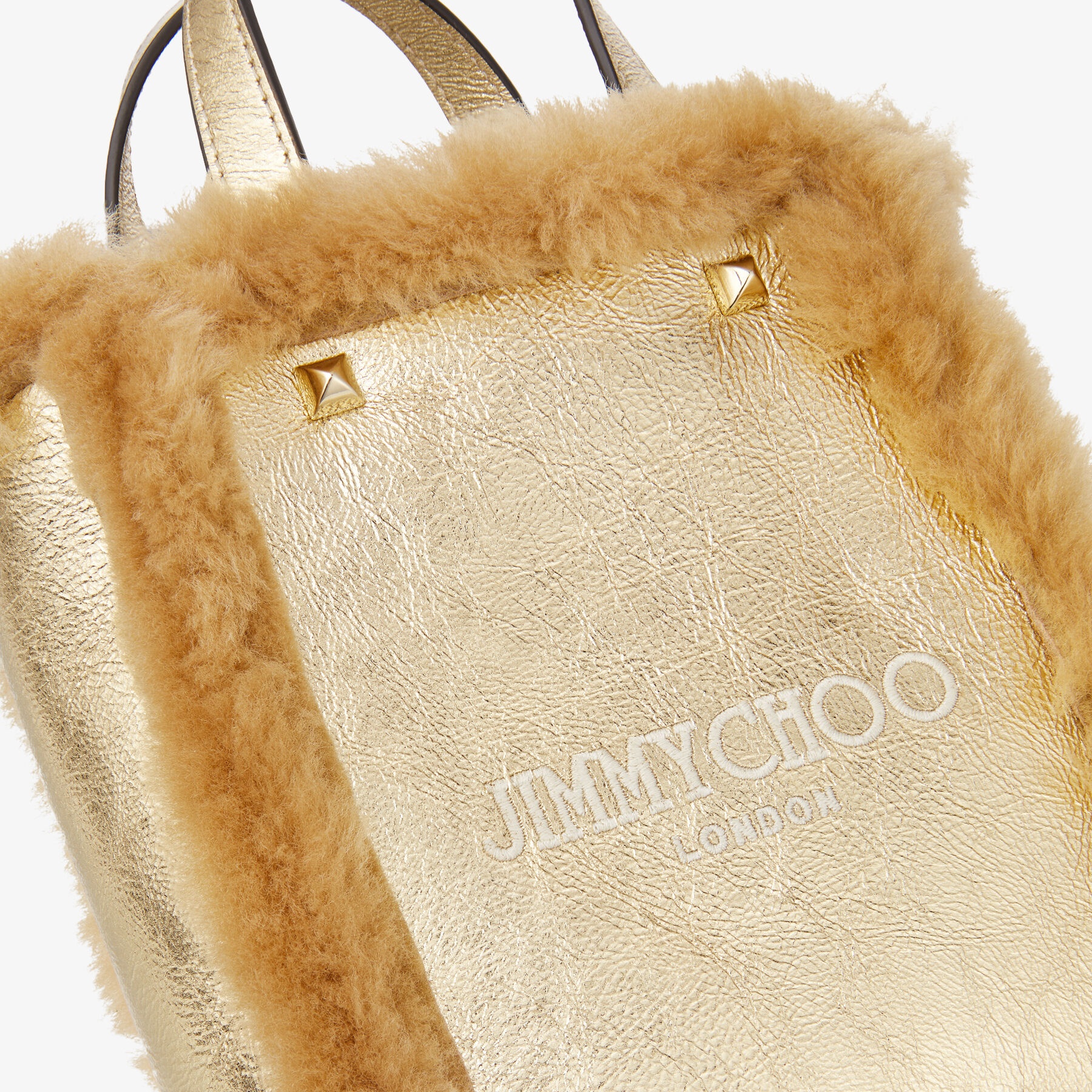 Mini N/s Tote
Gold Metallic Nappa and Shearling Mini N/S Tote Bag with Jimmy Choo Embroidery - 3