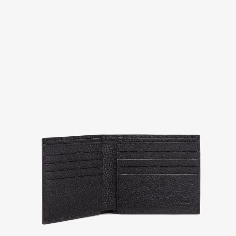 Bi-fold wallet, organized inside with eight card slots and two bill compartments. Branded with the F 3