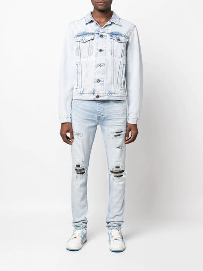 AMIRI distressed slim-fit jeans outlook