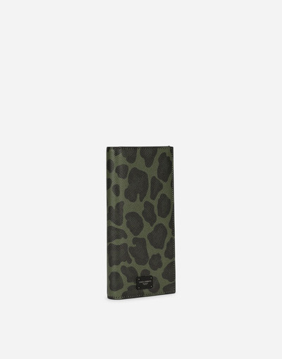 Dolce & Gabbana Dauphine calfskin vertical wallet with leopard print against a green background outlook