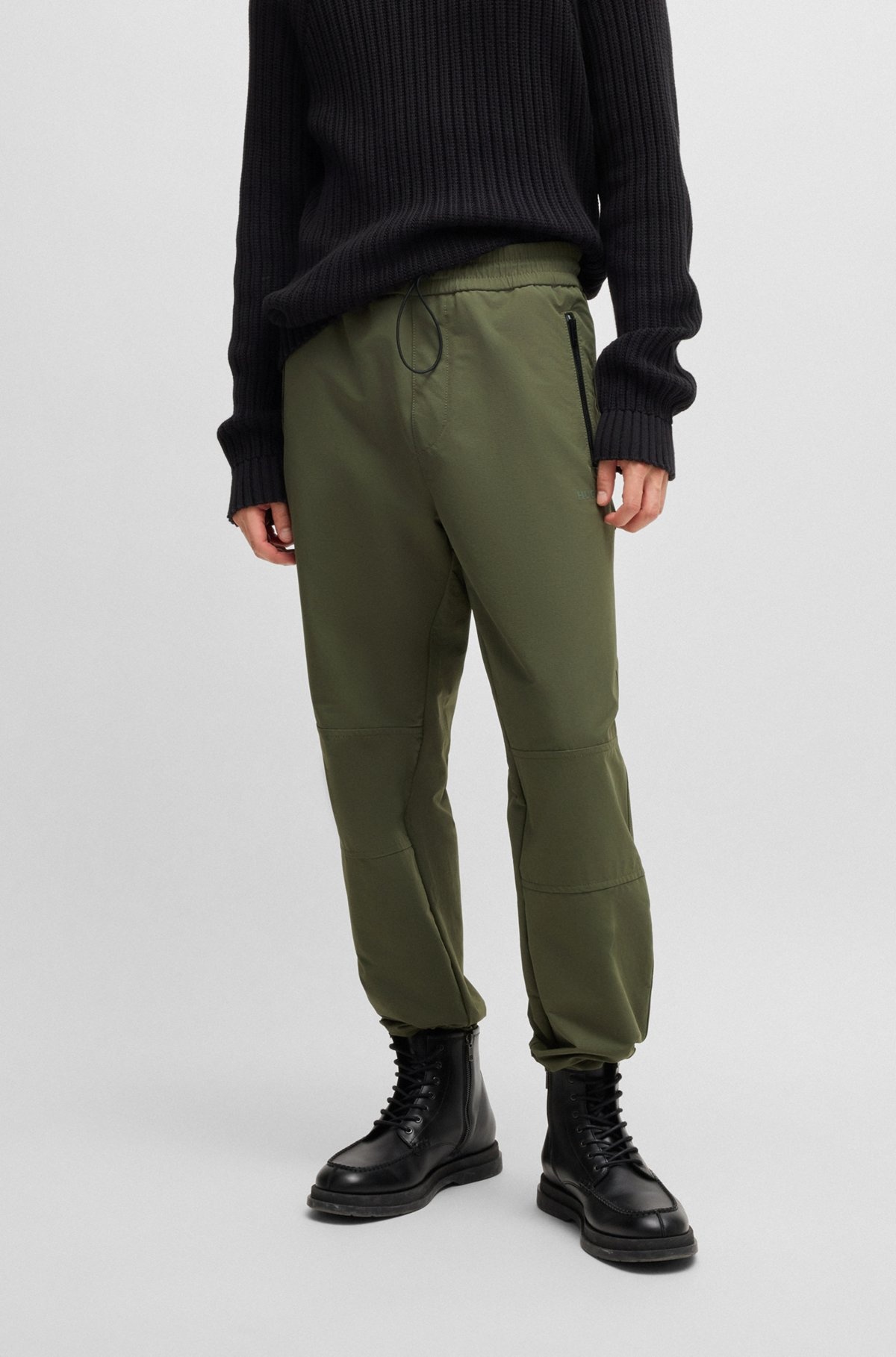 WATER-REPELLENT TROUSERS WITH ADJUSTABLE HEMS - 2