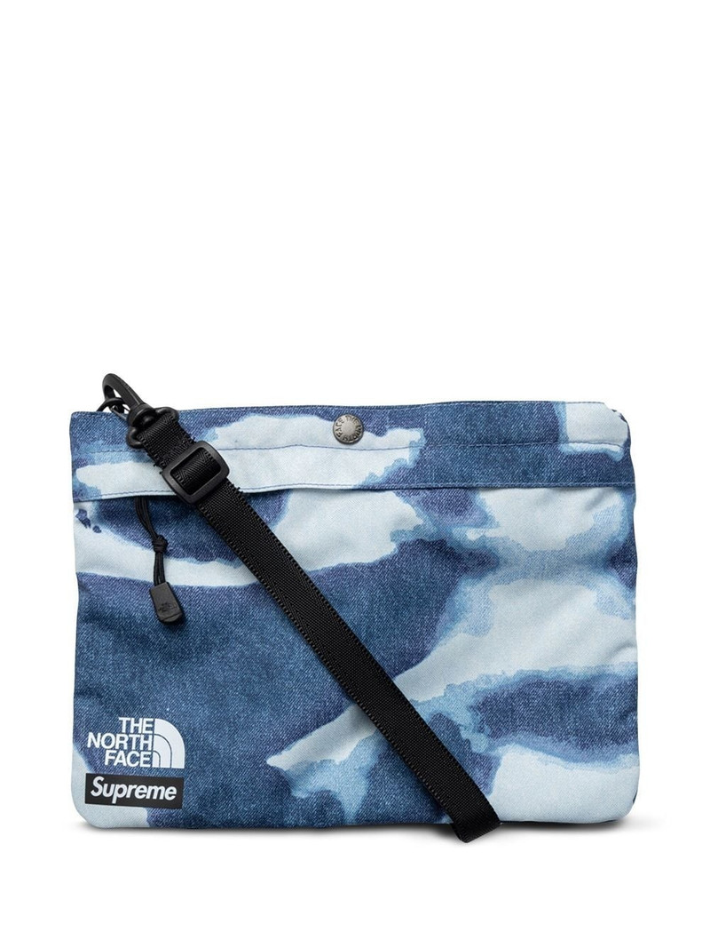 x TNF bleached denim print shoulder Bag 1