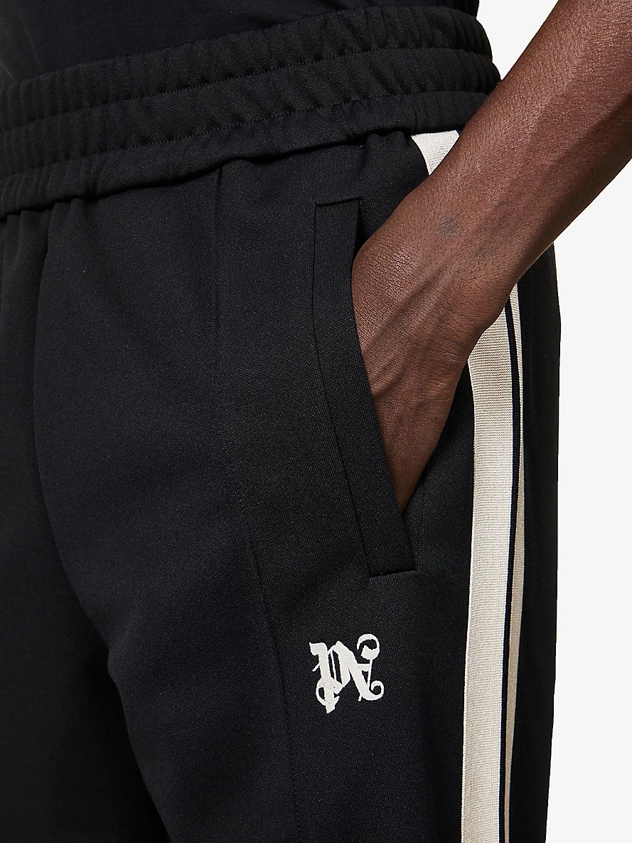 Monogram brand-patch straight-leg woven track trousers - 5