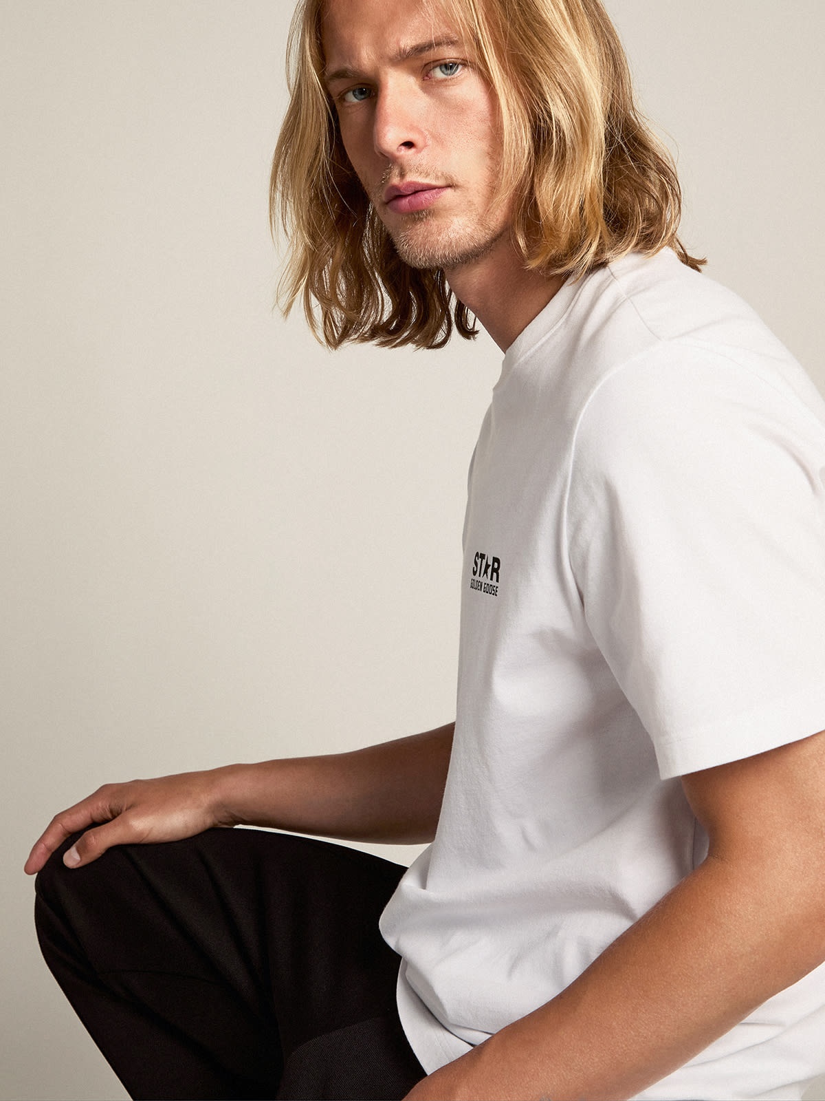 White T-shirt with contrasting black logo on the front - 2