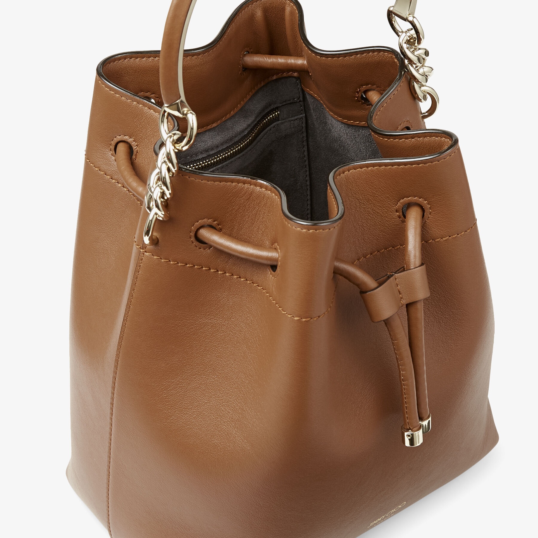 Bon Bon Bucket
Dark Tan Calf Leather Bag with Light Gold Metal Handle - 4