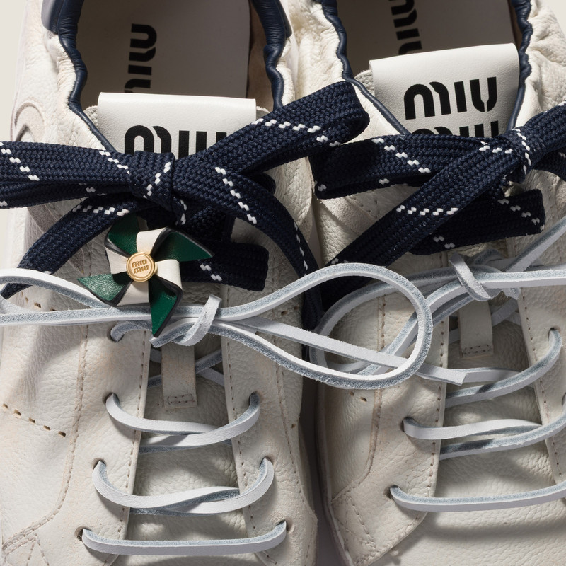 Miu Miu Leather pinwheel brooch outlook