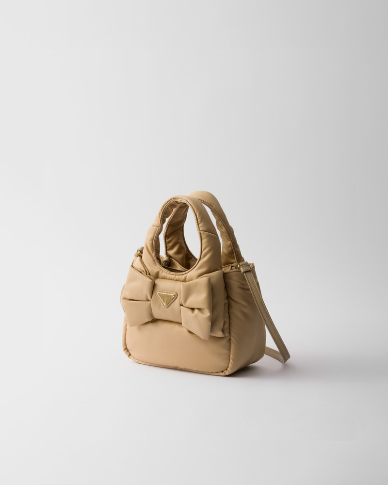 Prada Padded Re-Nylon mini-bag with bow outlook