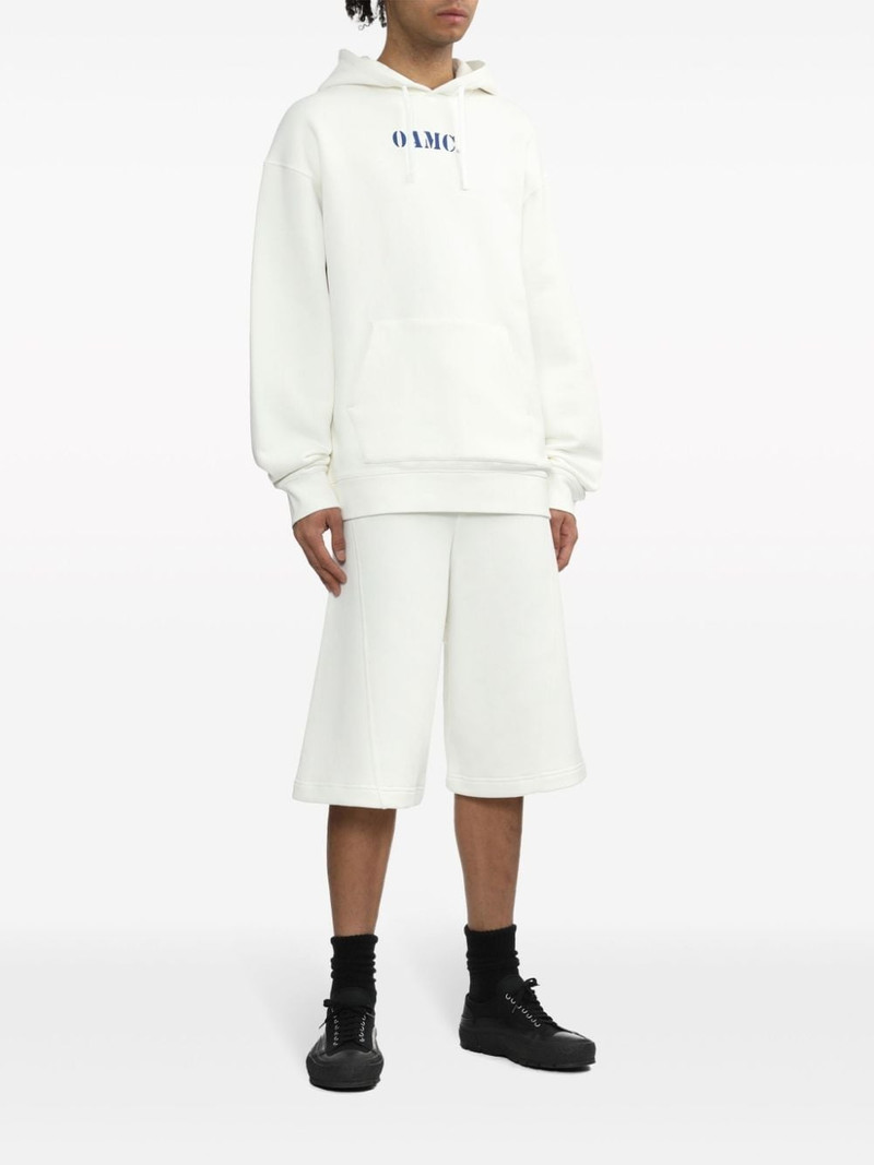 OAMC logo-print cotton track shorts outlook