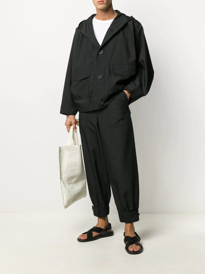 ISSEY MIYAKE buttoned-ankle tapered trousers outlook