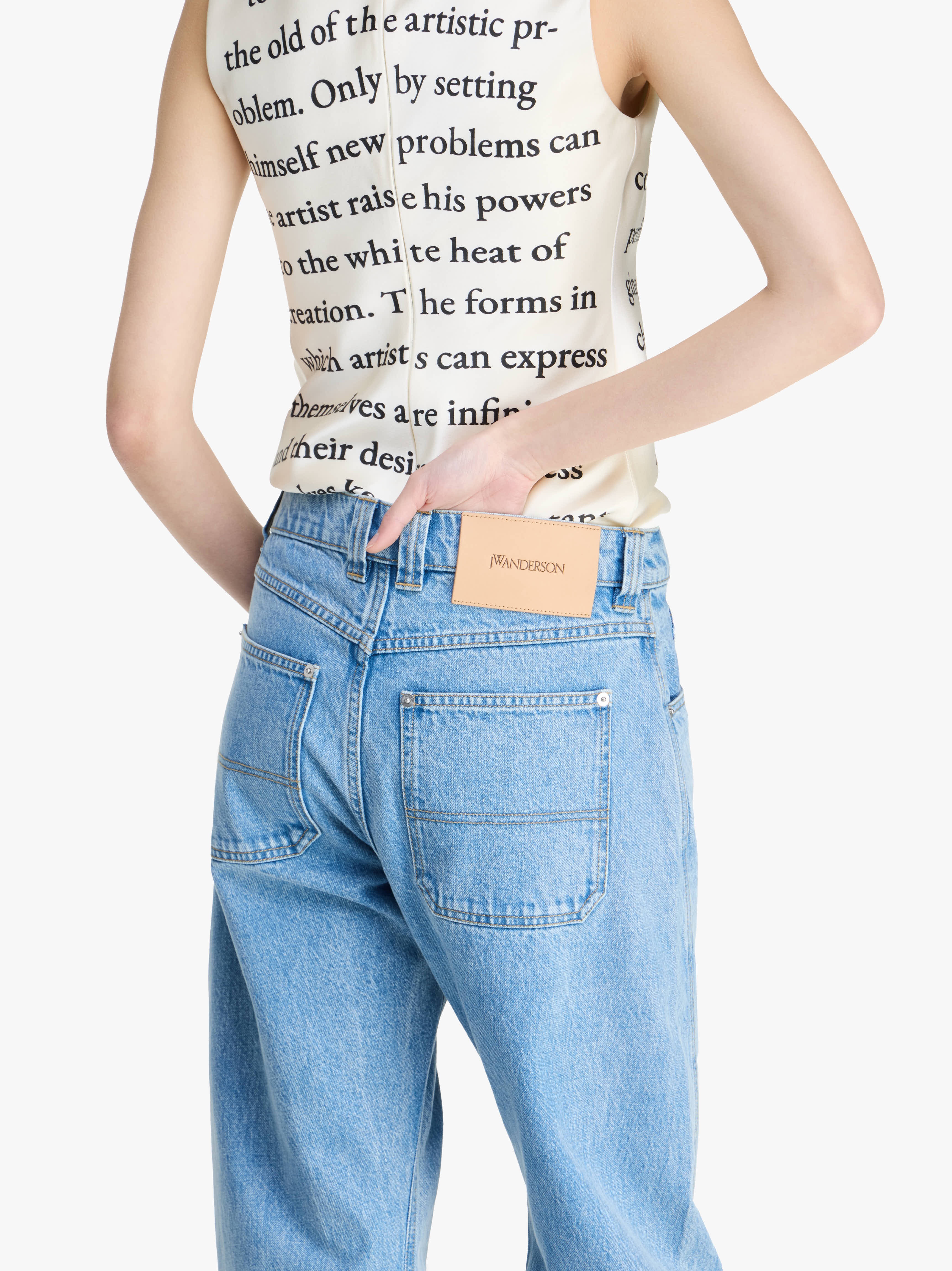 TWISTED SLIM LEG DENIM JEANS - 4