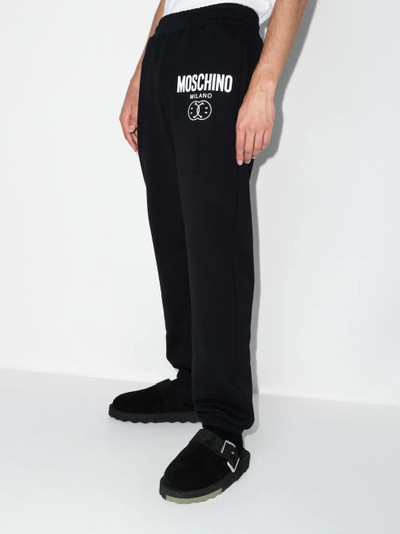 Moschino logo-print track pants outlook